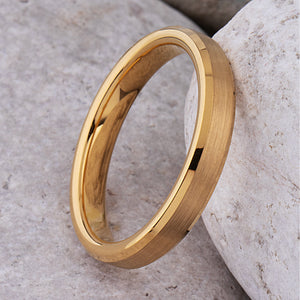 Yellow gold tungsten wedding ring with a brushed finish and polished beveled edges.