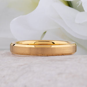 Yellow gold tungsten wedding ring with a brushed finish and polished beveled edges, elegant for men and women.